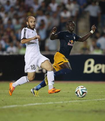 SOCCER - CL, Qarabag vs RBS BAKU,AZERBAIJAN,30.JUL.14 - SOCCER - UEFA Champions League, qualifying, Qarabag Agdam FK vs Red Bull Salzburg. Image shows Ilgar Gurbanov (Qarabag) and Sadio Mane (RBS).