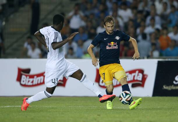 SOCCER - CL, Qarabag vs RBS BAKU,AZERBAIJAN,30.JUL.14 - SOCCER - UEFA Champions League, qualifying, Qarabag Agdam FK vs Red Bull Salzburg. Image shows Leroy George (Qarabag) and Andreas Ulmer (RBS).