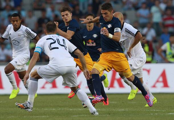SOCCER - CL, Qarabag vs RBS BAKU,AZERBAIJAN,30.JUL.14 - SOCCER - UEFA Champions League, qualifying, Qarabag Agdam FK vs Red Bull Salzburg. Image shows Admir Teli (Qarabag), Marcel Sabitzer and Jonatan Soriano (RBS).