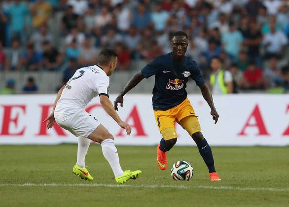 SOCCER - CL, Qarabag vs RBS BAKU,AZERBAIJAN,30.JUL.14 - SOCCER - UEFA Champions League, qualifying, Qarabag Agdam FK vs Red Bull Salzburg. Image shows Qara Qarayev (Qarabag) and Naby Keita (RBS).
