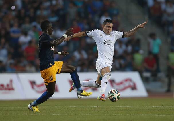 SOCCER - CL, Qarabag vs RBS BAKU,AZERBAIJAN,30.JUL.14 - SOCCER - UEFA Champions League, qualifying, Qarabag Agdam FK vs Red Bull Salzburg. Image shows Sadio Mane (RBS) and Reynaldo (Qarabag).