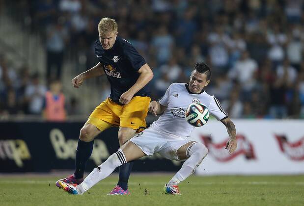 SOCCER - CL, Qarabag vs RBS BAKU,AZERBAIJAN,30.JUL.14 - SOCCER - UEFA Champions League, qualifying, Qarabag Agdam FK vs Red Bull Salzburg. Image shows Martin Hinteregger (RBS) and Reynaldo (Qarabag).