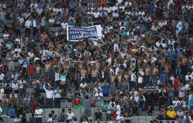 SOCCER - CL, Qarabag vs RBS BAKU,AZERBAIJAN,30.JUL.14 - SOCCER - UEFA Champions League, qualifying, Qarabag Agdam FK vs Red Bull Salzburg. Image shows fans of Qarabag.