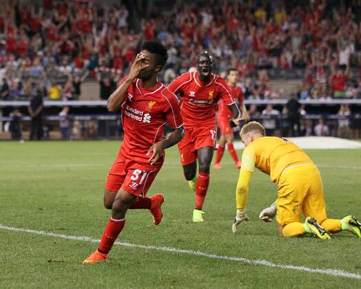 Liverpool s Raheem Sterling celebrates scoring his sides second goal - International Champions Cup 2014 - Manchester City vs Liverpool - Yankee Stadium - New York - USA - 30th July 2014 - Picture David Klein Sportimage EDITORIAL USE ONLY. No use with unauthorised audio, video, data, fixture lists, club league logos or live services. Online in-match use limited to 120 images, no video emulation. No use in betting, games or single club league player publications.