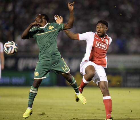 20140805 - LIEGE, BELGIUM: Panathinaikos Abdul Jeleel Ajagun and Standard s Tortol Lumanza fight for the ball during the return leg match between Greek soccer team Panathinaikos and Belgian first league soccer team Standard de Liege in the third qualifying round of the UEFA Champions League competition, Tuesday 05 August 2014, in Athens. The first leg match resulted in a 0-0 draw. YORICKxJANSENS  000001 premiumd 20211033