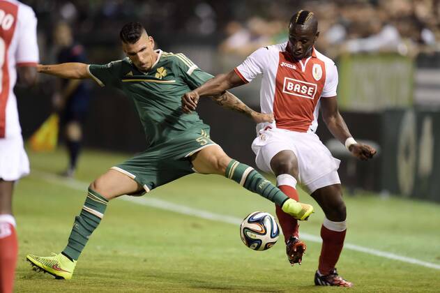 20140805 - LIEGE, BELGIUM: Panathinaikos Konstantino Triantafyllopoulos and Standard s Paul-Jose Mpoku Ebunge fight for the ball during the return leg match between Greek soccer team Panathinaikos and Belgian first league soccer team Standard de Liege in the third qualifying round of the UEFA Champions League competition, Tuesday 05 August 2014, in Athens. The first leg match resulted in a 0-0 draw. YORICKxJANSENS  premiumd Aufmach20211118