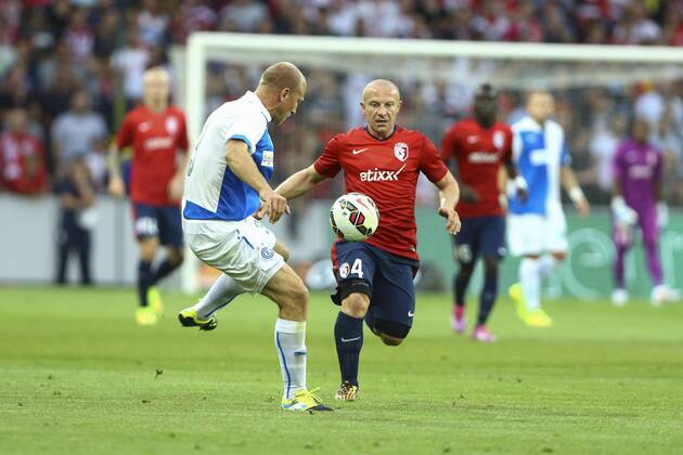 Stephane Grichting (Grasshopper Zurich) vs Florent Balmont (Lille) FOOTBALL : OSC Lille vs Grasshopper Club Zürich - Champions League, third qualifying round - 05 08 2014 GwendolineLeGoff 