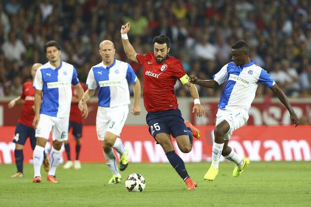 Stephane Grichting (Grasshopper Zurich) vs Marko Basa (Lille) Nathan Sinkala (Grasshopper Zurich) FOOTBALL : LOSC vs Grasshopper Club Zurich - 3eme tour preliminaire - Ligue des Champions - 05 08 2014 GwendolineLeGoff Panoramic 