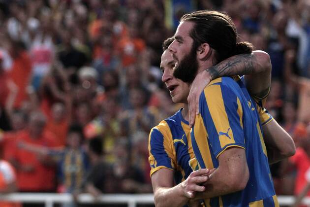 Apoel players celebrate a goal during their Champions League third qualifying round second leg against HJK Helsinki at GSP stadium in Nicosia, Cyprus, Tuesday, August 6, 2014 APOEL vs HJK Helsinki Champions League 2014 2015