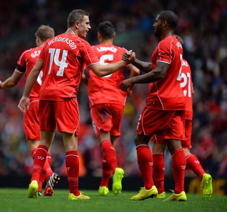 Liverpool s Jordan Henderson celebrates scoring the 4th goal- Pre Season Friendly - Liverpool vs Borussia Dortmund - Anfield Stadium - Liverpool - England - 10th August 2014 - Pic Paul Currie Sportimage EDITORIAL USE ONLY. No use with unauthorised audio, video, data, fixture lists, club league logos or live services. Online in-match use limited to 120 images, no video emulation. No use in betting, games or single club league player publications.