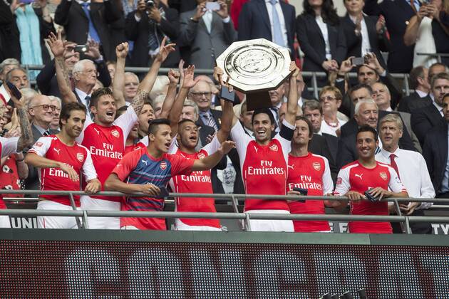Arsenal s Mikel Arteta lifts the Community Shield - Arsenal vs. Manchester City - The FA Community Shield - Wembley Stadium - London - 10 08 2014 EDITORIAL USE ONLY. No use with unauthorised audio, video, data, fixture lists, club league logos or live services. Online in-match use limited to 120 images, no video emulation. No use in betting, games or single club league player publications.