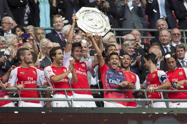 Arsenal s Olivier Giroud and Alexis Sanchez lift the Community Shield - Arsenal vs. Manchester City - The FA Community Shield - Wembley Stadium - London - 10 08 2014 EDITORIAL USE ONLY. No use with unauthorised audio, video, data, fixture lists, club league logos or live services. Online in-match use limited to 120 images, no video emulation. No use in betting, games or single club league player publications.