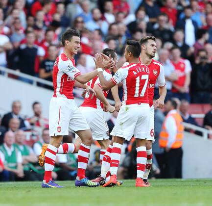 Arsenal s Laurent Koscielny celebrates scoring his sides opening goal - Barclays Premier League - Arsenal vs Crystal Palace - Emirates Stadium - London - England - 16th August 2014 - Picture David Klein Sportimage EDITORIAL USE ONLY. No use with unauthorised audio, video, data, fixture lists, club league logos or live services. Online in-match use limited to 120 images, no video emulation. No use in betting, games or single club league player publications.