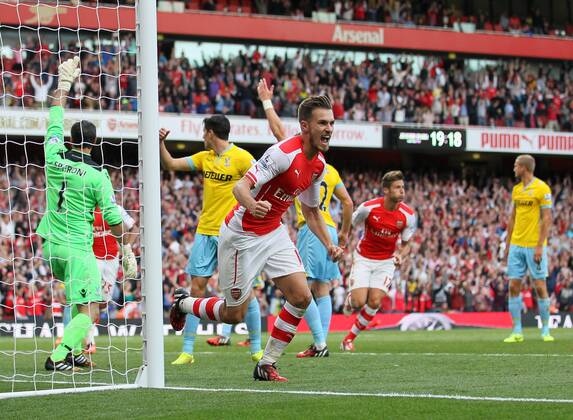 Arsenal s Aaron Ramsey celebrates scoring his sides second goal - Barclays Premier League - Arsenal vs Crystal Palace - Emirates Stadium - London - England - 16th August 2014 - Picture David Klein Sportimage EDITORIAL USE ONLY. No use with unauthorised audio, video, data, fixture lists, club league logos or live services. Online in-match use limited to 120 images, no video emulation. No use in betting, games or single club league player publications.