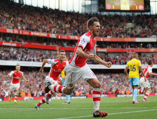 Arsenal s Aaron Ramsey celebrates scoring his sides second goal - Barclays Premier League - Arsenal vs Crystal Palace - Emirates Stadium - London - England - 16th August 2014 - Picture David Klein Sportimage EDITORIAL USE ONLY. No use with unauthorised audio, video, data, fixture lists, club league logos or live services. Online in-match use limited to 120 images, no video emulation. No use in betting, games or single club league player publications.
