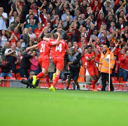 Liverpool s Raheem Sterling celebrates-- Barclays Premier League - Liverpool vs Southampton - Anfield Stadium - Liverpool - England - 17th August 2014 - Pic Paul Currie Sportimage EDITORIAL USE ONLY. No use with unauthorised audio, video, data, fixture lists, club league logos or live services. Online in-match use limited to 120 images, no video emulation. No use in betting, games or single club league player publications.