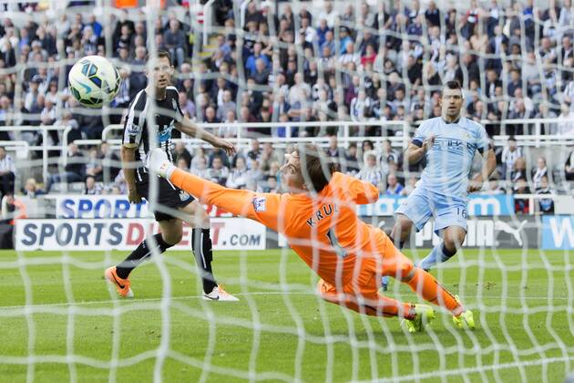 Sergio Aguero of Manchester City scores his sides second goal - Newcastle United vs. Manchester City - Barclays Premier League - St James Park - Newcastle - 17 08 2014 Pic Philip Oldham Sportimage EDITORIAL USE ONLY. No use with unauthorised audio, video, data, fixture lists, club league logos or live services. Online in-match use limited to 120 images, no video emulation. No use in betting, games or single club league player publications.