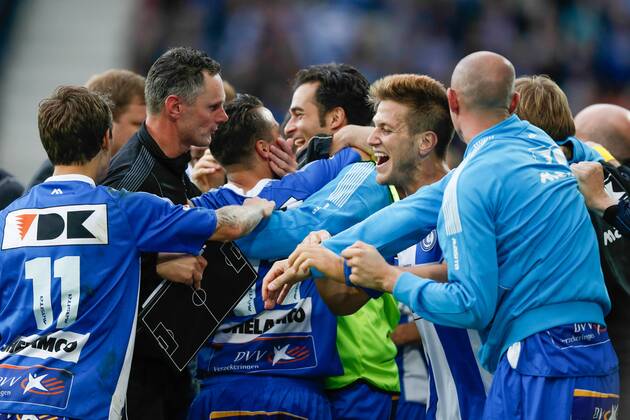 20140817 - GENT, BELGIUM: Gent s Danijel Milicevic (C) celebrates with his teammates after scoring during the Jupiler Pro League match between KAA Gent and Zulte Waregem, in Gent, Sunday 17 August 2014, on day 4 of the Belgian soccer championship. BRUNOxFAHY 04280121