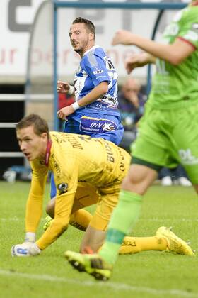 20140817 - GENT, BELGIUM: Gent s Danijel Milicevic (rear) celebrates after scoring during the Jupiler Pro League match between KAA Gent and Zulte Waregem, in Gent, Sunday 17 August 2014, on day 4 of the Belgian soccer championship. LAURIExDIEFFEMBACQ 04280153