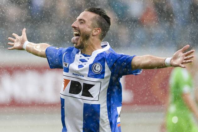 20140817 - GENT, BELGIUM: Gent s Danijel Milicevic celebrates after scoring during the Jupiler Pro League match between KAA Gent and Zulte Waregem, in Gent, Sunday 17 August 2014, on day 4 of the Belgian soccer championship. LAURIExDIEFFEMBACQ 04280373