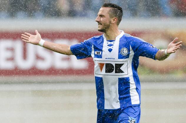 20140817 - GENT, BELGIUM: Gent s Danijel Milicevic celebrates after scoring during the Jupiler Pro League match between KAA Gent and Zulte Waregem, in Gent, Sunday 17 August 2014, on day 4 of the Belgian soccer championship. LAURIExDIEFFEMBACQ 04280378