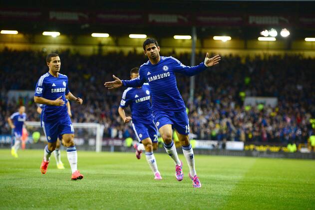 Diego Costa of Chelsea celebrates scoring the equalising goal - Barclays Premier League - Burnley vs Chelsea - Turf Moor Stadium - Burnley - England - 18th August 2014 - Pic Simon Bellis Sportimage EDITORIAL USE ONLY. No use with unauthorised audio, video, data, fixture lists, club league logos or live services. Online in-match use limited to 120 images, no video emulation. No use in betting, games or single club league player publications.