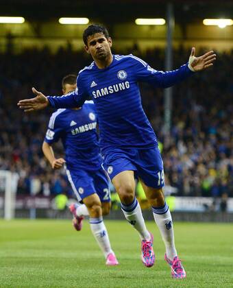 Diego Costa of Chelsea celebrates scoring the equalising goal - Barclays Premier League - Burnley vs Chelsea - Turf Moor Stadium - Burnley - England - 18th August 2014 - Pic Simon Bellis Sportimage EDITORIAL USE ONLY. No use with unauthorised audio, video, data, fixture lists, club league logos or live services. Online in-match use limited to 120 images, no video emulation. No use in betting, games or single club league player publications.