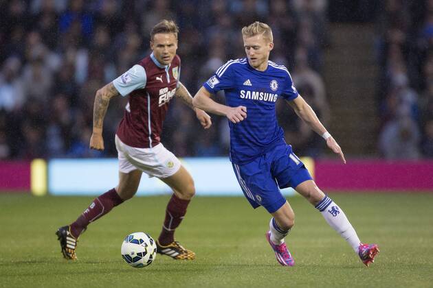 Matthew Taylor of Burnley and Andre Schurrle of Chelsea - Burnley vs. Chelsea - Barclays Premier League - Turf Moor - Burnley - 17 08 2014 Pic Philip Oldham Sportimage EDITORIAL USE ONLY. No use with unauthorised audio, video, data, fixture lists, club league logos or live services. Online in-match use limited to 120 images, no video emulation. No use in betting, games or single club league player publications.