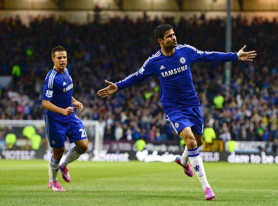 Diego Costa of Chelsea celebrates scoring the equalising goal - Barclays Premier League - Burnley vs Chelsea - Turf Moor Stadium - Burnley - England - 18th August 2014 - Pic Simon Bellis Sportimage EDITORIAL USE ONLY. No use with unauthorised audio, video, data, fixture lists, club league logos or live services. Online in-match use limited to 120 images, no video emulation. No use in betting, games or single club league player publications.
