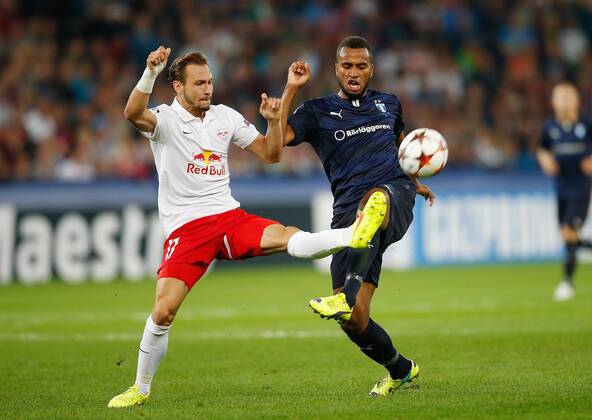 SOCCER - CL, RBS vs Malmö SALZBURG,AUSTRIA,19.AUG.14 - SOCCER - UEFA Champions League, play off, Red Bull Salzburg vs Malmö FF. Image shows Andreas Ulmer (RBS) and Isaac Kiese Thelin (Malmö). 