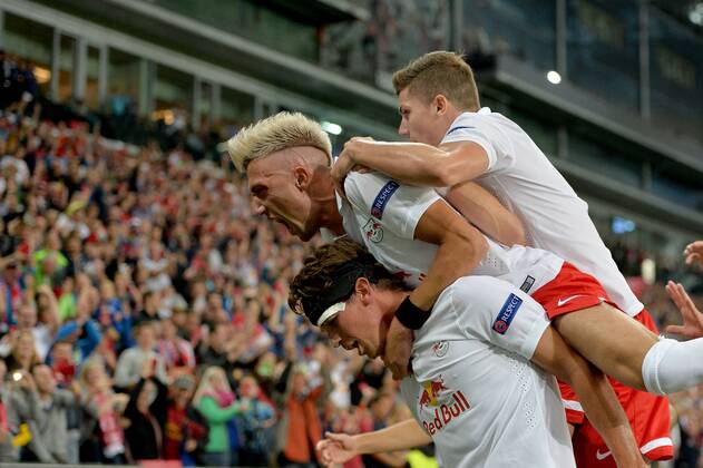 SOCCER - CL, RBS vs Malmö SALZBURG,AUSTRIA,19.AUG.14 - SOCCER - UEFA Champions League, play off, Red Bull Salzburg vs Malmö FF. Image shows the rejoicing of Franz Schiemer, Kevin Kampl and Marcel Sabitzer (RBS). 