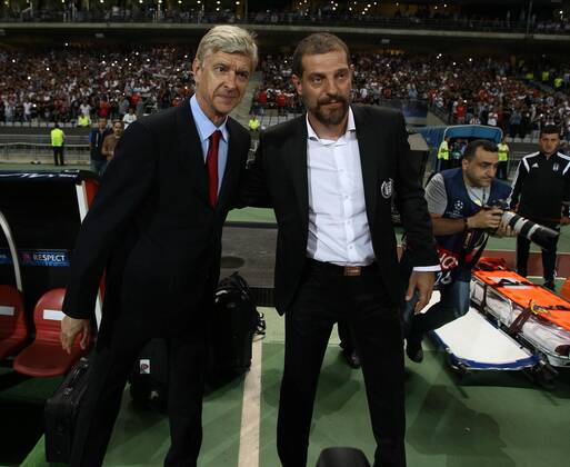 UEFA Champions League playoff first leg match match between Besiktas and Arsenal at Olympic stadium in istanbul 19 august 2014. Pictured: Coach Arsene Wenger of Arsenal and Coach Slaven Bilic of Besiktas. 