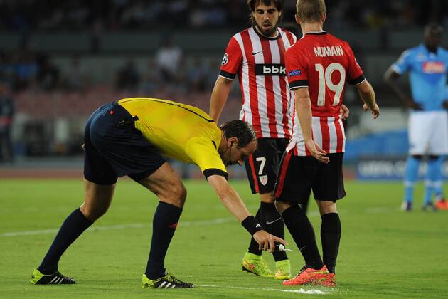 Aug. 19, 2014 - Naples, Italy - the ref using spy during the UEFA Champions League Qualifying Play Off First Leg match between SSC Napoli and Athletic Club Bilbao Football Soccer at Stadio San Paolo on August 19, 2014 in Naples, Italy. SSC Napoli and Athletic Club Bilbao - UEFA Champions League Qualifying Play Off First Leg  - ZUMAn23