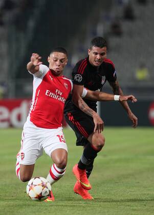 UEFA Champions League playoff first leg match match between Besiktas and Arsenal at Olympic stadium in istanbul 19 august 2014. Score: Besiktas 0 - Arsenal 0 Pictured: Alexander (Alex) Mark David Oxlade Chamberlain of Arsenal and Ramon Motta of Besiktas. 