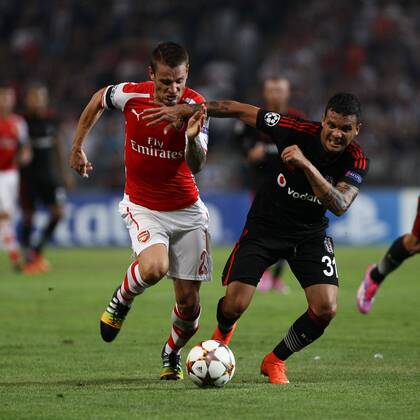 UEFA Champions League playoff first leg match match between Besiktas and Arsenal at Olympic stadium in istanbul 19 august 2014. Score: Besiktas 0 - Arsenal 0 Pictured: Mathieu Debuchy (L) of Arsenal and Ramon Motta of Besiktas. 
