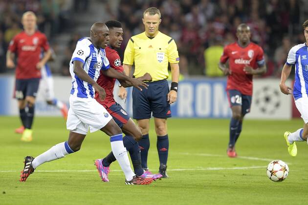 Salomon KALOU (lille) vs Bruno Martins Indi (Porto) FOOTBALL : Lille vs Porto FC - tour preliminaire - ligue des champions - 20 08 2014 JBAutissier Panoramic 