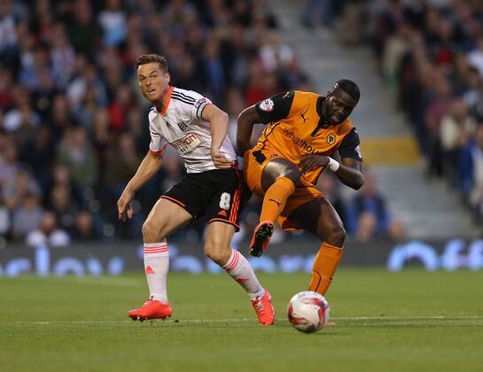 Fulham s Scott Parker tussles with Wolves Bakary Sako - Sky Bet Championship - Fulham vs Wolverhampton Wanderers - Craven Cottage - London - England - 20th August 2014 - Picture David Klein Sportimage EDITORIAL USE ONLY. No use with unauthorised audio, video, data, fixture lists, club league logos or live services. Online in-match use limited to 120 images, no video emulation. No use in betting, games or single club league player publications.