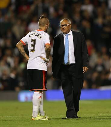 Fulham s Felix Magath talks to Konstantinos Staffylidis - Sky Bet Championship - Fulham vs Wolverhampton Wanderers - Craven Cottage - London - England - 20th August 2014 - Picture David Klein Sportimage EDITORIAL USE ONLY. No use with unauthorised audio, video, data, fixture lists, club league logos or live services. Online in-match use limited to 120 images, no video emulation. No use in betting, games or single club league player publications.
