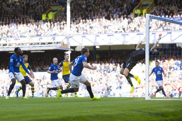 Seamus Coleman of Everton opens the scoring - FC Everton vs. FC Arsenal - Barclays Premier League - Goodison Park - Liverpool - 23 08 2014 Pic Philip Oldham Sportimage EDITORIAL USE ONLY. No use with unauthorised audio, video, data, fixture lists, club league logos or live services. Online in-match use limited to 120 images, no video emulation. No use in betting, games or single club league player publications.