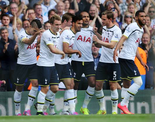 Tottenham s Nacer Chadli celebrates scoring his sides opening goal - Barclays Premier League - Tottenham vs Queens Park Rangers - White Hart Lane - London - England - 24th August 2014 - Picture David Klein Sportimage EDITORIAL USE ONLY. No use with unauthorised audio, video, data, fixture lists, club league logos or live services. Online in-match use limited to 120 images, no video emulation. No use in betting, games or single club league player publications.
