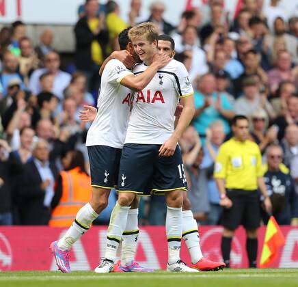 Tottenham s Nacer Chadli celebrates scoring his sides third goal with Eric Dier - Barclays Premier League - Tottenham vs Queens Park Rangers - White Hart Lane - London - England - 24th August 2014 - Picture David Klein Sportimage EDITORIAL USE ONLY. No use with unauthorised audio, video, data, fixture lists, club league logos or live services. Online in-match use limited to 120 images, no video emulation. No use in betting, games or single club league player publications.