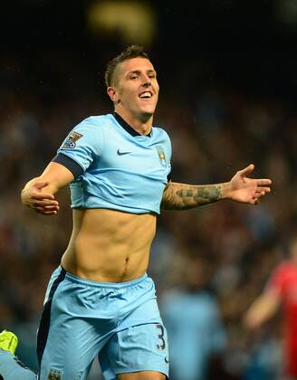 Stevan Jovetic of Manchester City celebrates scoring his and city s second goal - Barclays Premier League - Manchester City vs Liverpool - Etihad Stadium - Manchester - England - 25th August 2014 - Pic Simon Bellis Sportimage EDITORIAL USE ONLY. No use with unauthorised audio, video, data, fixture lists, club league logos or live services. Online in-match use limited to 120 images, no video emulation. No use in betting, games or single club league player publications.