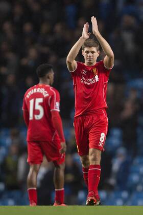 Steven Gerrard of Liverpool applaud the travelling fans - Manchester City vs. Liverpool - Barclays Premier League - Etihad Stadium - Manchester - 25 08 2014 Pic Philip Oldham Sportimage EDITORIAL USE ONLY. No use with unauthorised audio, video, data, fixture lists, club league logos or live services. Online in-match use limited to 120 images, no video emulation. No use in betting, games or single club league player publications.