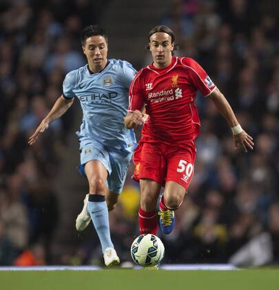 Samir Nasri of Manchester City chases Lazar Markovic of Liverpool - Manchester City vs. Liverpool - Barclays Premier League - Etihad Stadium - Manchester - 25 08 2014 Pic Philip Oldham Sportimage EDITORIAL USE ONLY. No use with unauthorised audio, video, data, fixture lists, club league logos or live services. Online in-match use limited to 120 images, no video emulation. No use in betting, games or single club league player publications.