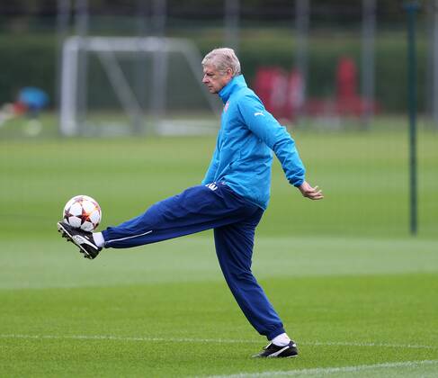 Arsenal s Arsene Wenger in action during training - Champions League Training - London Colney - London - England - 26th August 2014 - Picture David Klein Sportimage EDITORIAL USE ONLY. No use with unauthorised audio, video, data, fixture lists, club league logos or live services. Online in-match use limited to 120 images, no video emulation. No use in betting, games or single club league player publications.