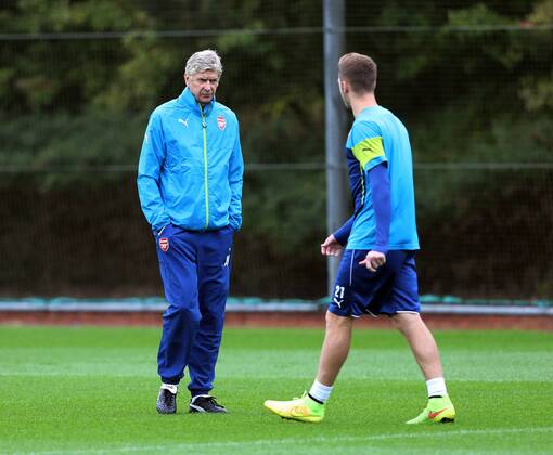 Arsenal s Arsene Wenger in action during training - Champions League Training - London Colney - London - England - 26th August 2014 - Picture David Klein Sportimage EDITORIAL USE ONLY. No use with unauthorised audio, video, data, fixture lists, club league logos or live services. Online in-match use limited to 120 images, no video emulation. No use in betting, games or single club league player publications.