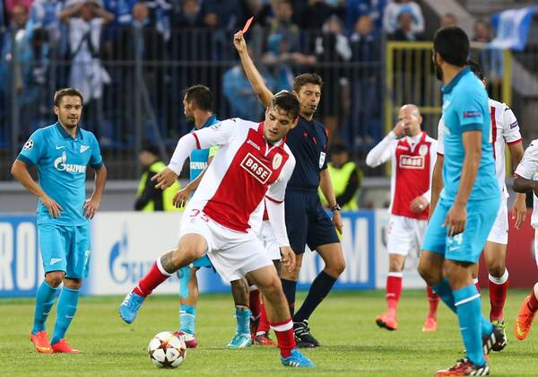 20140826 - SAINT PETERSBURG, RUSSIA: Zenit s Viktor Fayzulin receives a red card from the referee Italian Gianluca Rocchi during the return leg match of the playoffs for the UEFA Champions League competition between Russian team FC Zenit Saint Petersburg and Belgian soccer team Standard de Liege in Saint Petersburg, Russia, Tuesday 26 August 2014. Zenit won the first leg 0-1. VIRGINIExLEFOUR  premiumd 18548