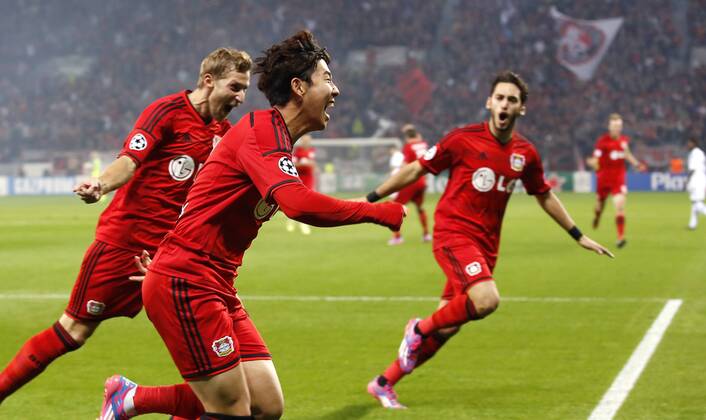 Leverkusens Heung-Min Son celebrates scoring the 1:0 witht teteammates during the Championsleague Play-off match between Bayer 04 Leverkusen and FC Kopenhagen, Bayarena in Leverkusen on August 27., 2013. Bayer 04 Leverkusen vs. FC Kopenhagen in der Champions League Qualifikation der Saison 2014 2015 am 27. August 2014.