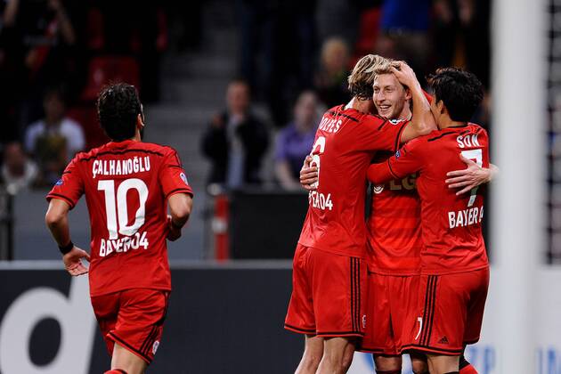Fußball Champions League Playoff Bayer Leverkusen - FC Kopenhagen am 27.08.2014 in der BayArena in Leverkusen v.l.n.r.: Hakan Calhanoglu ( Leverkusen ), Simon Rolfes ( Leverkusen ), Torschütze zum 3:0 Stefan Kiessling ( Leverkusen ), Son Heung-Min ( Leverkusen )