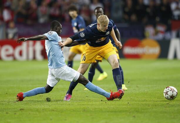 SOCCER - CL, Malmoe vs RBS MALMOE,SWEDEN,27.AUG.14 - SOCCER - UEFA Champions League, play off, Malmoe FF vs Red Bull Salzburg. Image shows Enoch Adu (Malmoe) and Martin Hinteregger (RBS). 